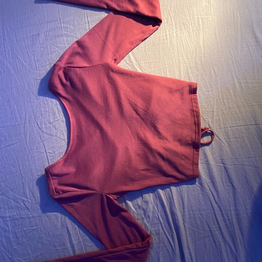 Red long sleeve with open back.